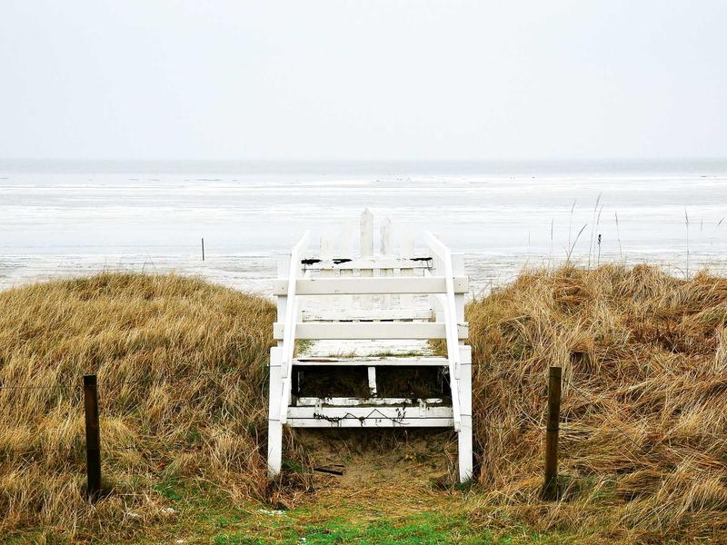 Macro shot of a luxury dark metallic surface with gold accents, highly detailed abstract technology, no human figures, no woman image